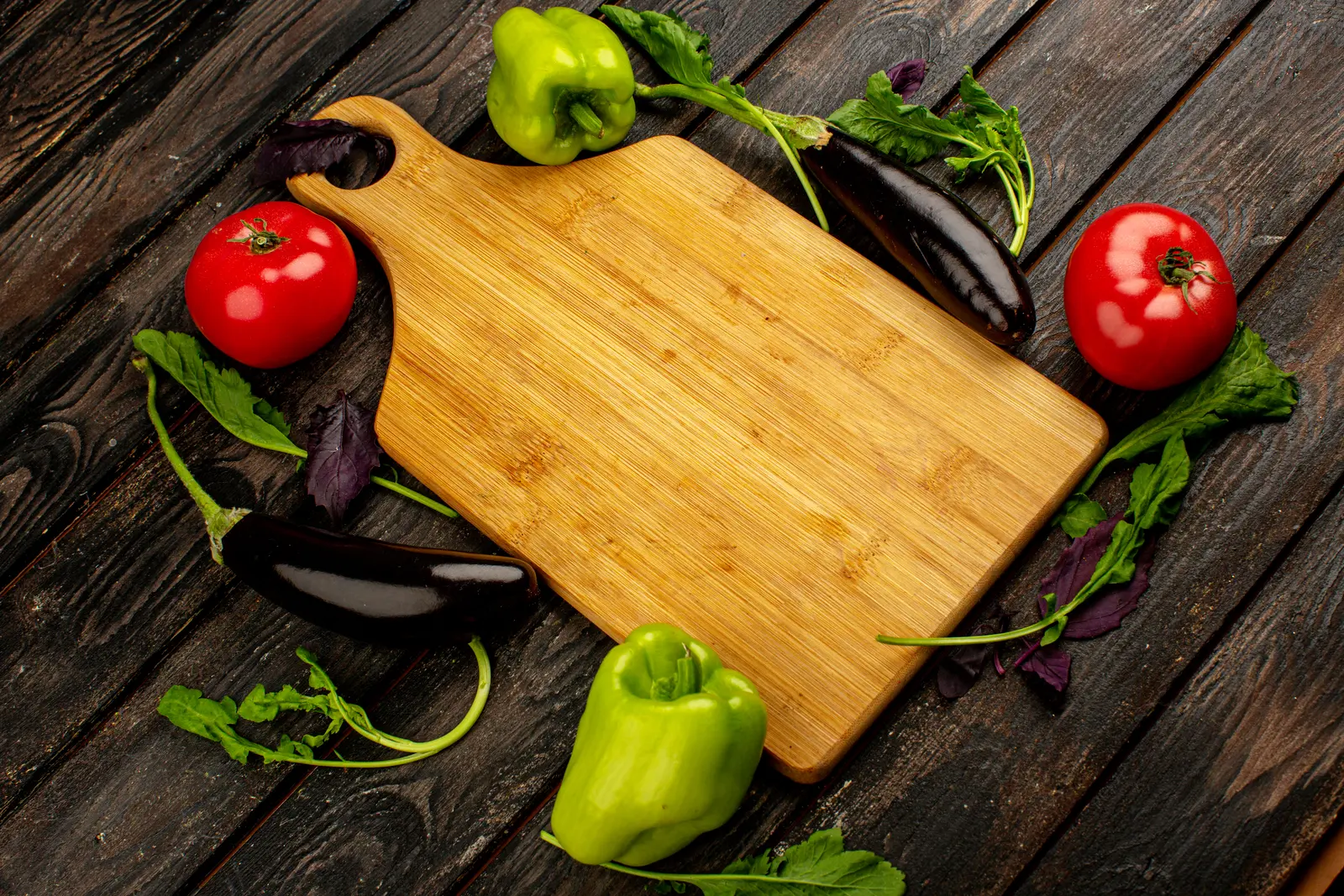 Fresh vegetables on a wooden chopping board
